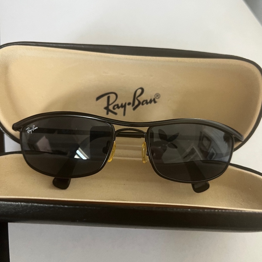 The Ray-Ban Junior RJ9502S, blue lenses, black frame